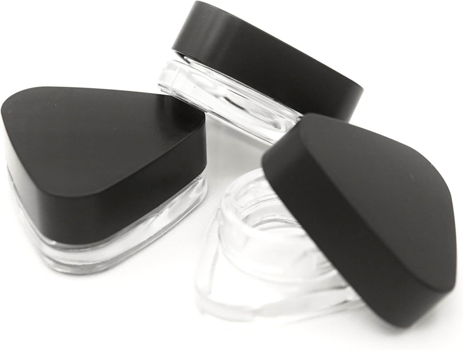 Child resistant 9ml triangle glass jars with black lids, perfect for concentrates and small-volume products.