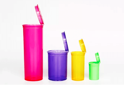 Variety of GLS Pop Top Dram Containers in vibrant colors: pink, purple, yellow, and green, showcasing convenience and child-resistance.