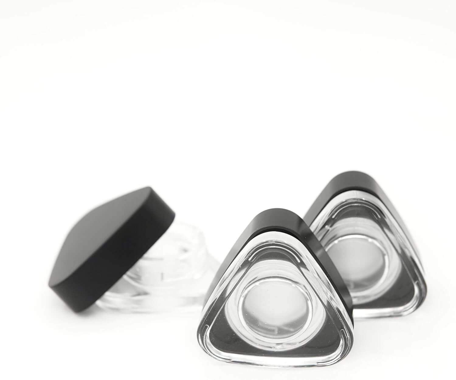 Child Resistant 9ml triangle glass jars with black lids for secure product packaging.