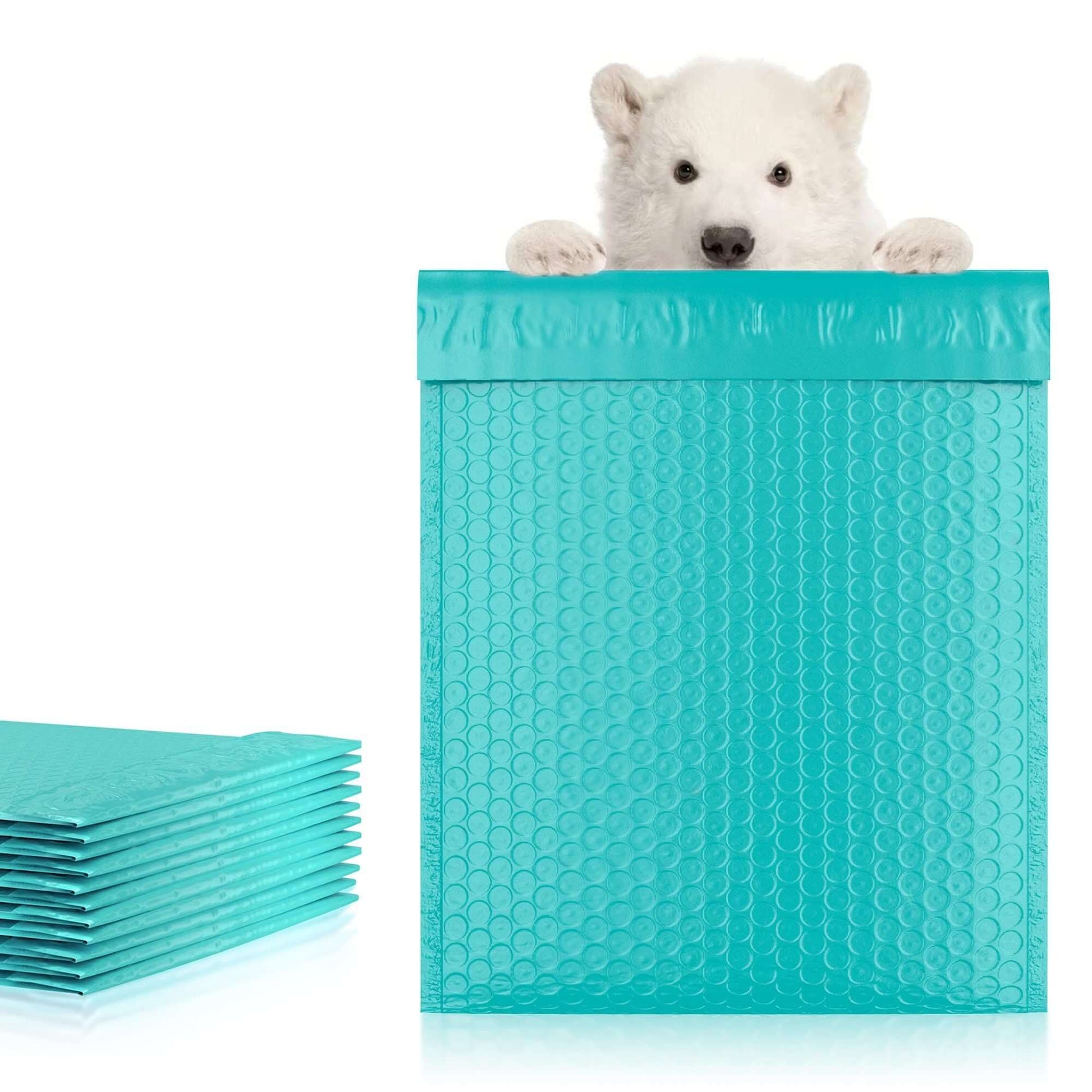 Teal poly bubble mailers with a cute puppy peeking over the top, showcasing durable and waterproof shipping envelopes.