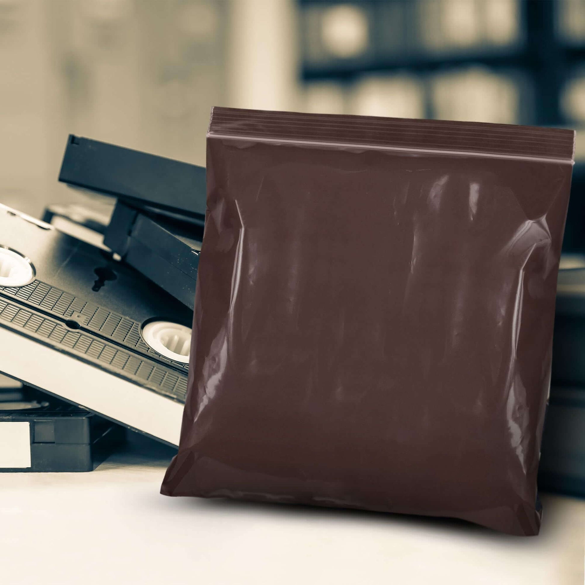 Amber zip bags for packaging, 8x8 inches, reclosable and durable, ideal for organizing small items.