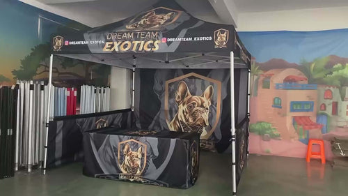 Custom 10x10 pop-up tent package with printed branding for Dream Team Exotics, featuring a French Bulldog design.